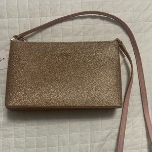 Kate Spade light pink sparkle cross body.